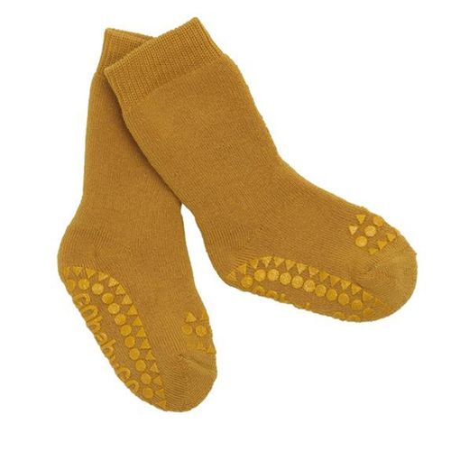 Un par de calcetines suela antideslizante mostaza Gobabygo